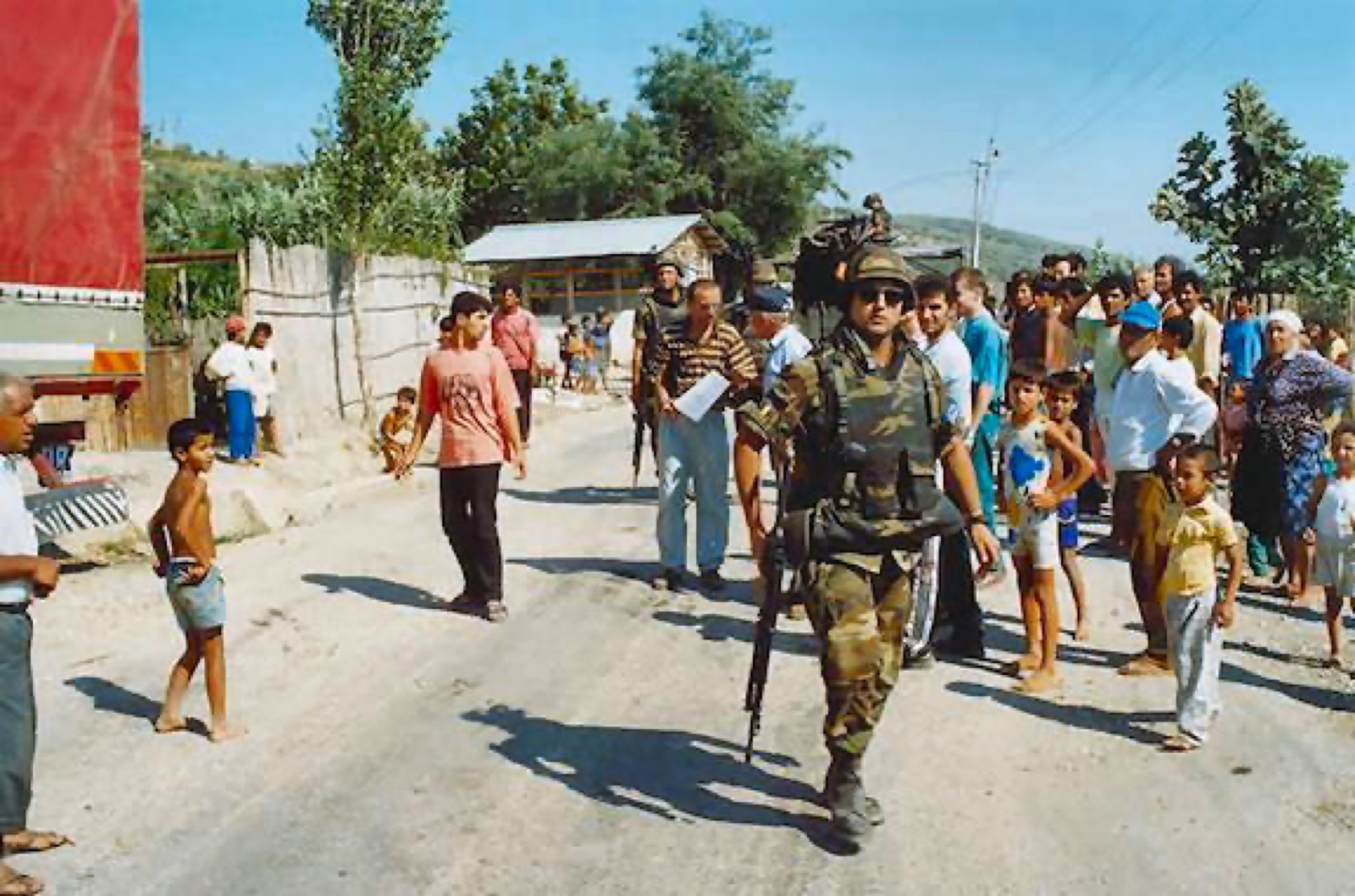 Italian soldier of the Multinational Protection Force in an Albanian village, May 1997.