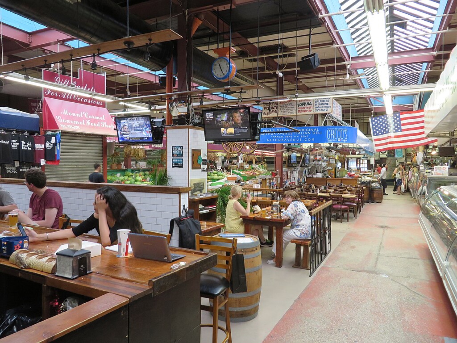Arthur Avenue Retail Market in the Bronx — the indoor market that has anchored Belmont's food trade for over eighty years.
