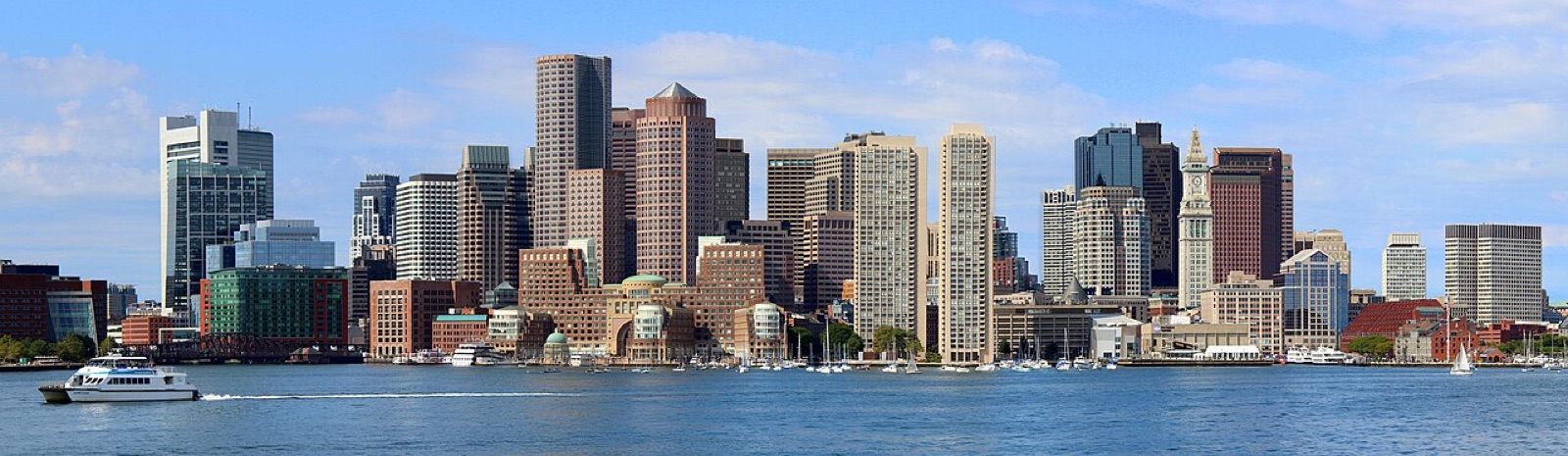 Boston Harbor view of the downtown skyline — the founding city of Albanian-American institutional life.