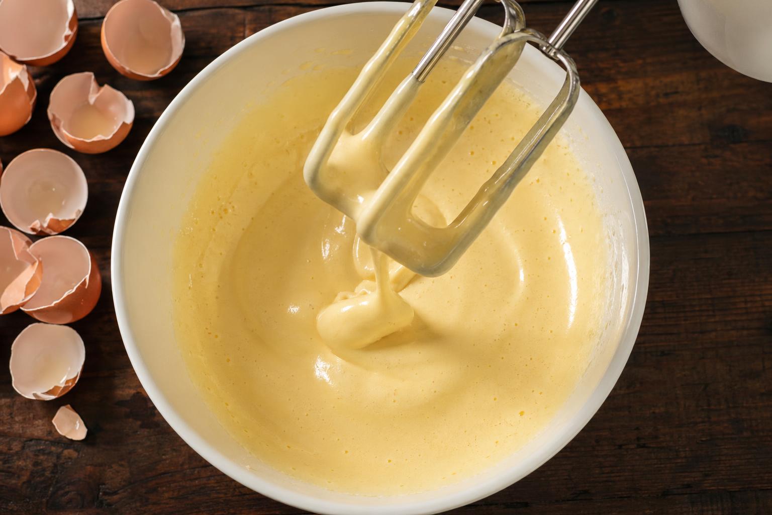 Eggs beaten to ribbon stage, pale yellow and tripled in volume