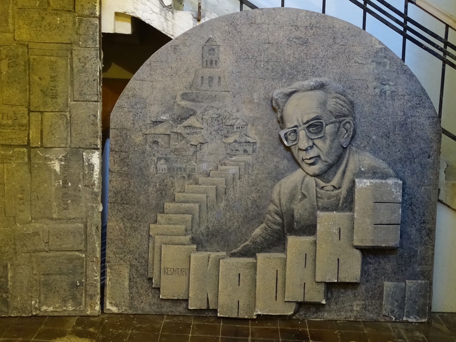 Sculpted frieze honoring Ismail Kadare on the wall of Gjirokastër Castle, his hometown.