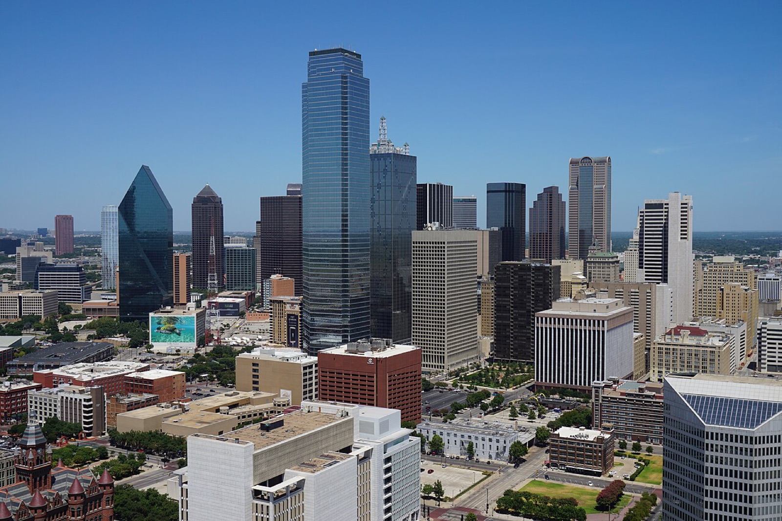 Downtown Dallas viewed from Reunion Tower — the metro that has quietly become a working Albanian-American civic center.